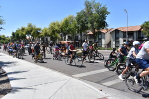 Group of cyclists stopped at traffic lights